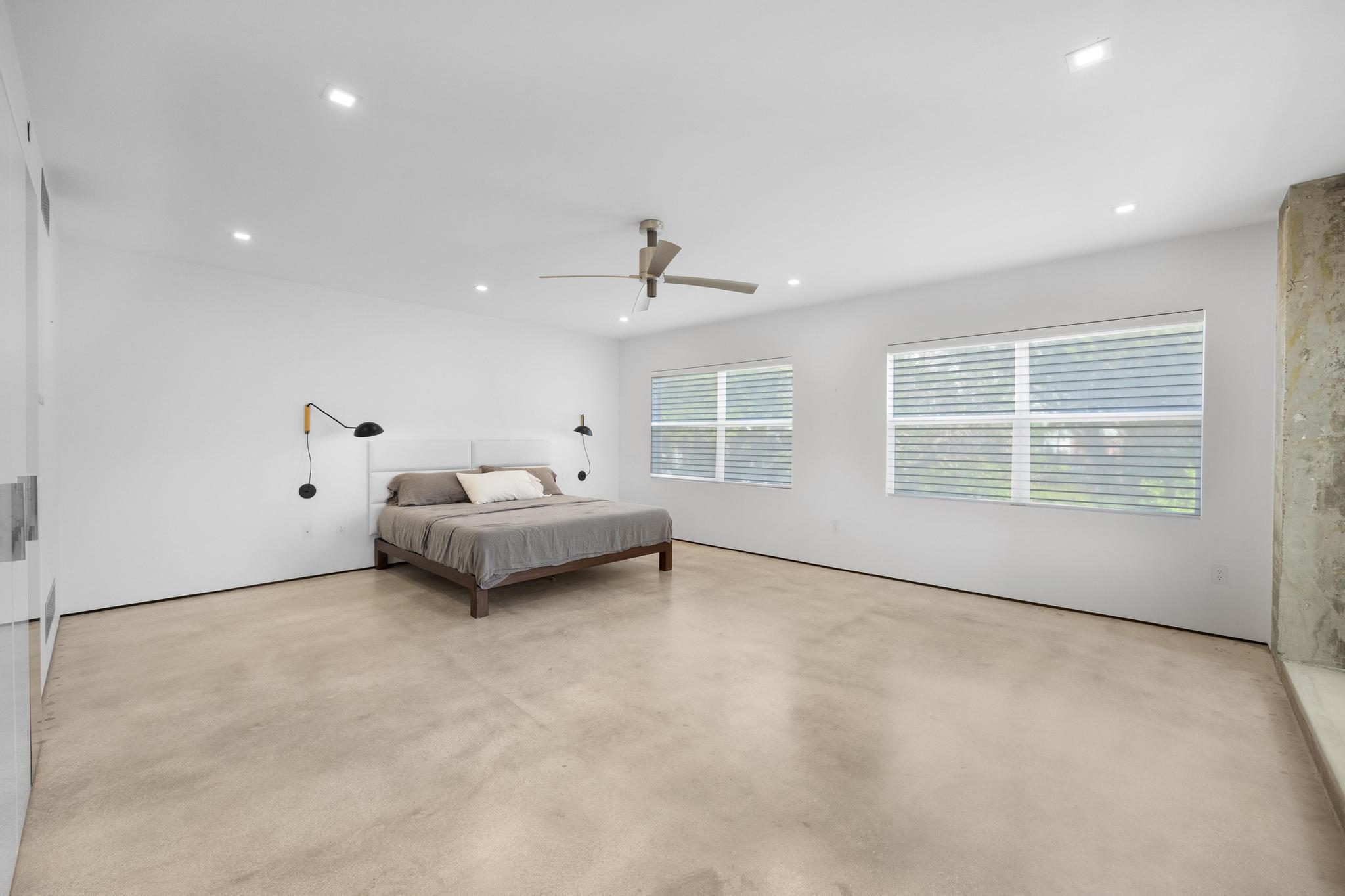 105 Front Street, Unit 122 Key West, FL 33040 - Photo 19 of 52 a living room with furniture and a window