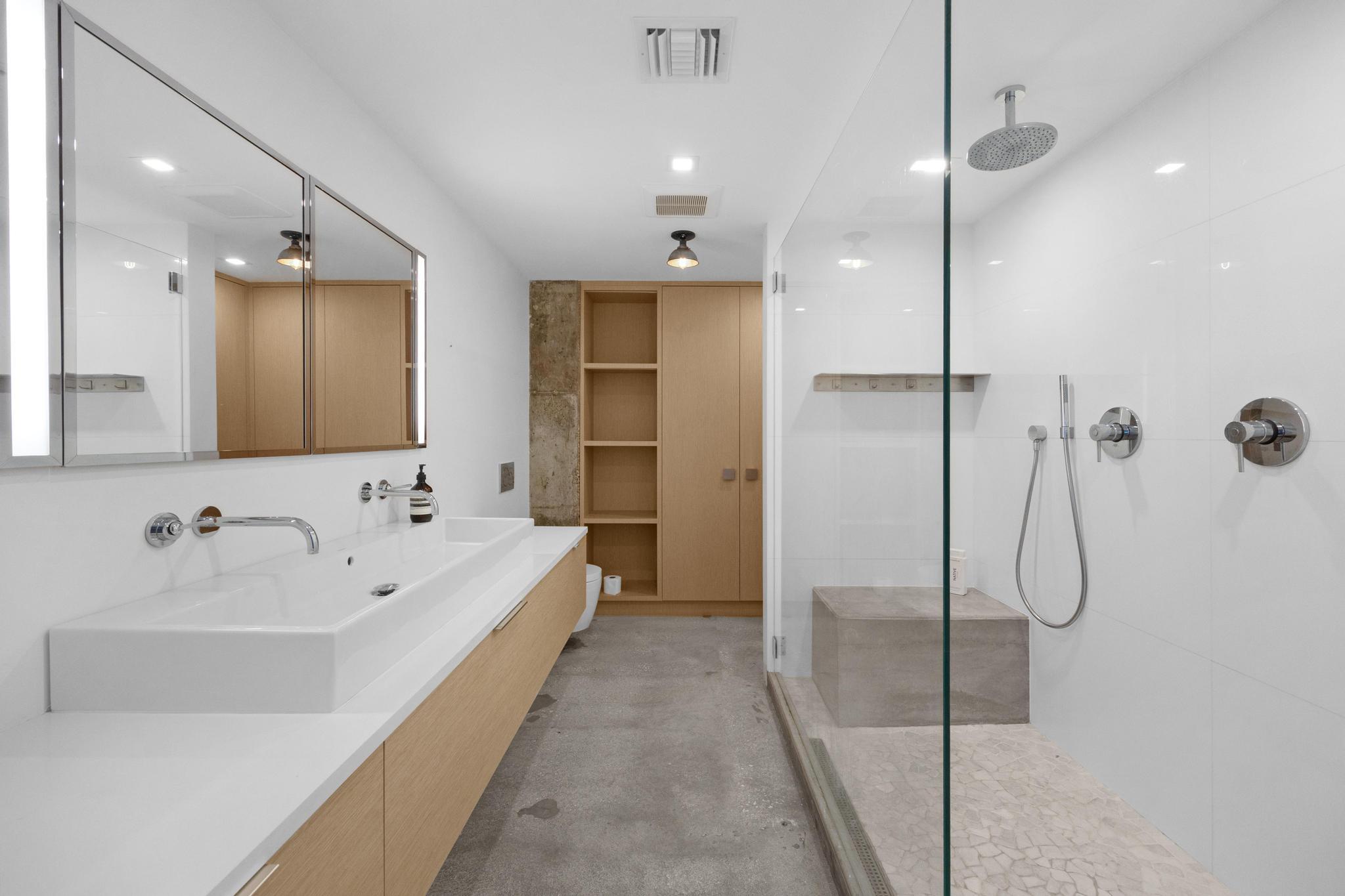 105 Front Street, Unit 122 Key West, FL 33040 - Photo 22 of 52 a bathroom with a bathtub and a sink