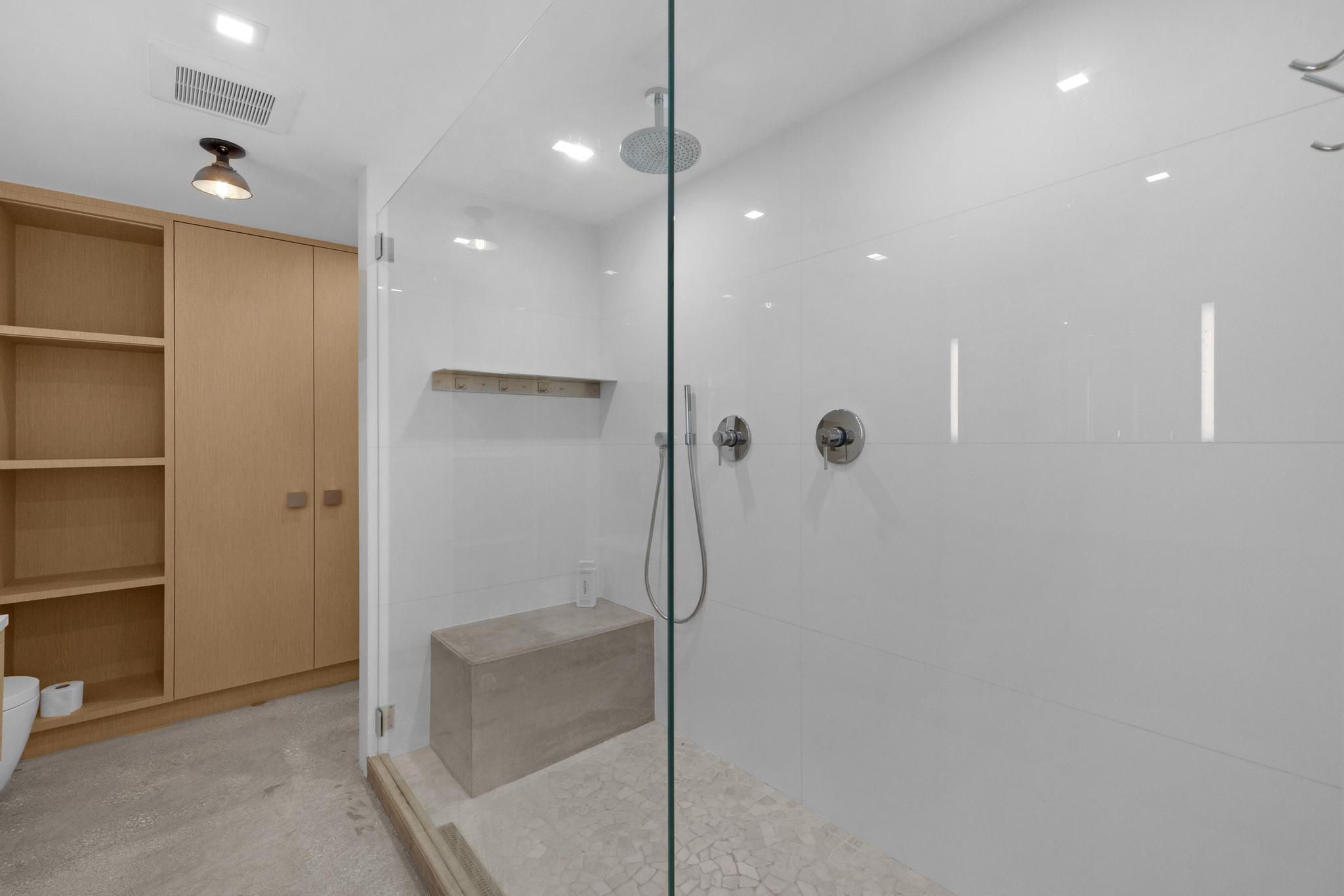 105 Front Street, Unit 122 Key West, FL 33040 - Photo 24 of 52 a bathroom with a shower