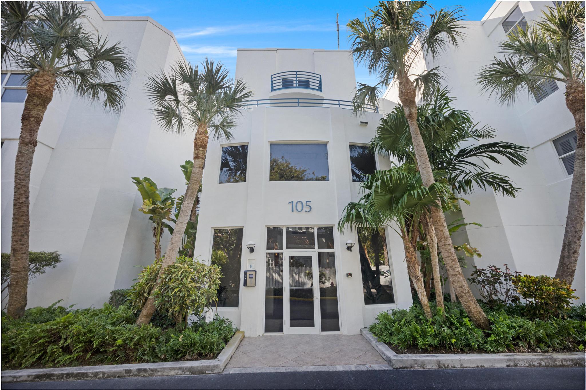 105 Front Street, Unit 122 Key West, FL 33040 - Photo 41 of 52 a front view of a house with a garden