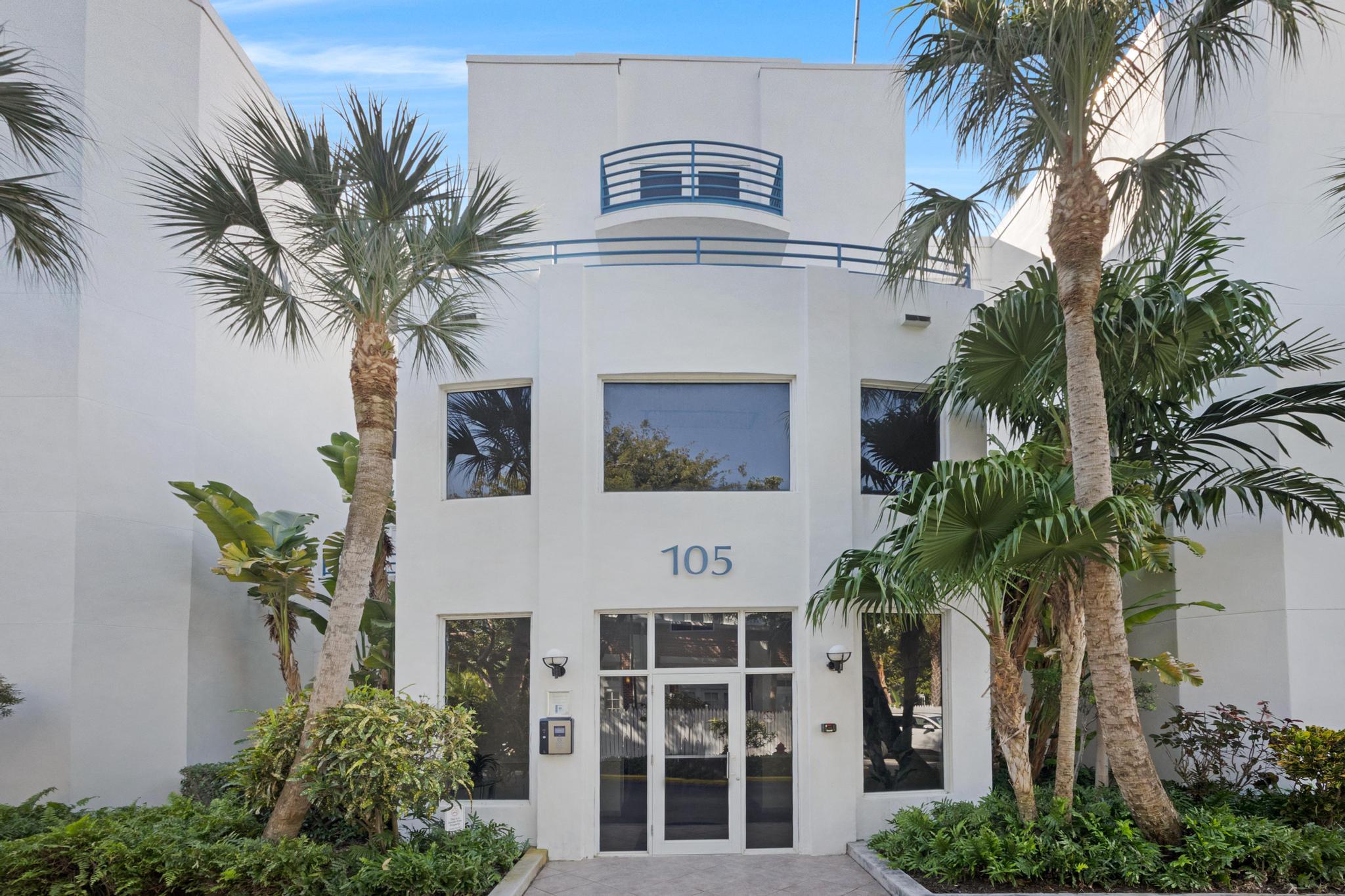 105 Front Street, Unit 122 Key West, FL 33040 - Photo 42 of 52 a front view of a house with a plants