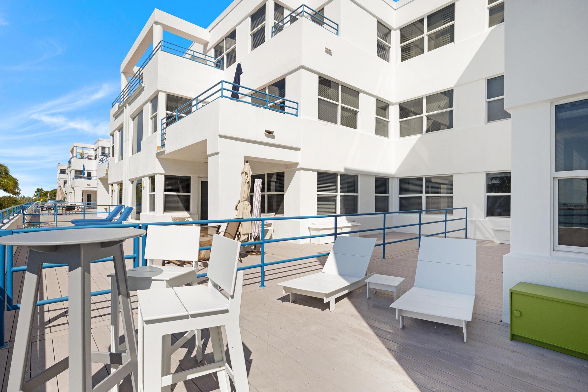 105 Front Street, Unit 122 Key West, FL 33040 - Photo 7 of 52 a view of a building with a sitting area