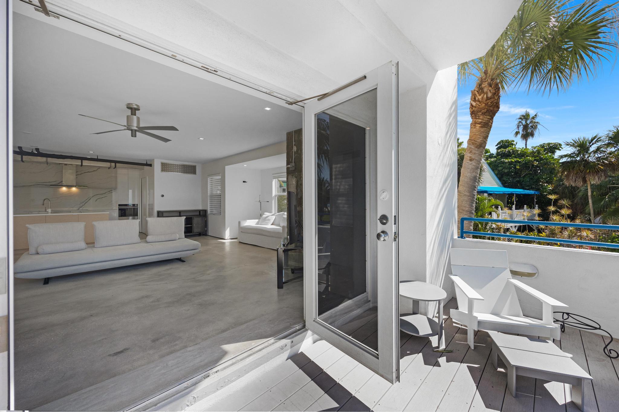 105 Front Street, Unit 122 Key West, FL 33040 - Photo 8 of 52 a view of a living room and a balcony