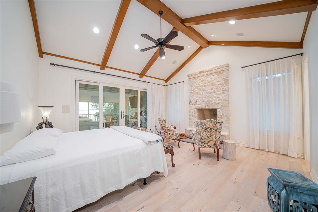 582 Windy Point Mount Vernon, TX 75457 - Photo 21 of 38 Bedroom featuring french doors, beamed ceiling, wood finished floors, high vaulted ceiling, and recessed lighting