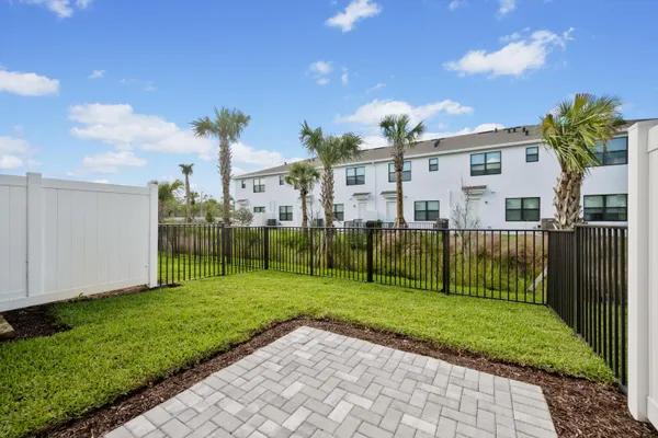 a view of a garden in front of a house