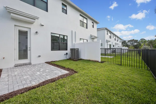 a view of a backyard with a garden