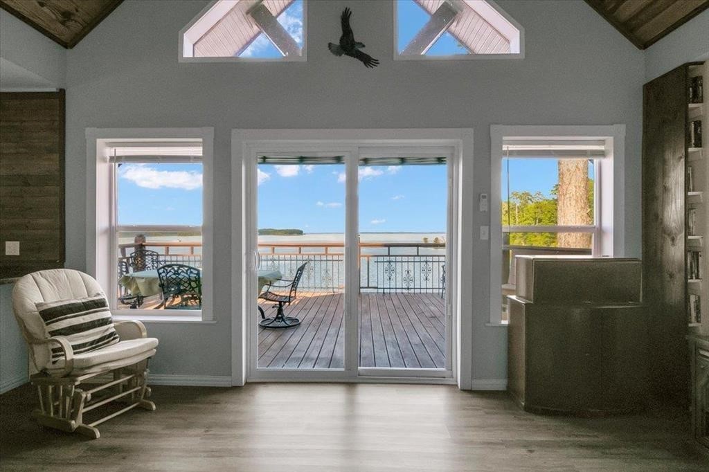 500 Two Coves Hemphill, TX 75948 - Photo 14 of 36 a view of workspace with wooden floor and windows