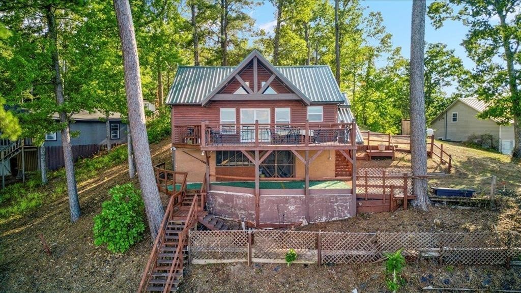 500 Two Coves Hemphill, TX 75948 - Photo 20 of 36 a view of a house with a yard