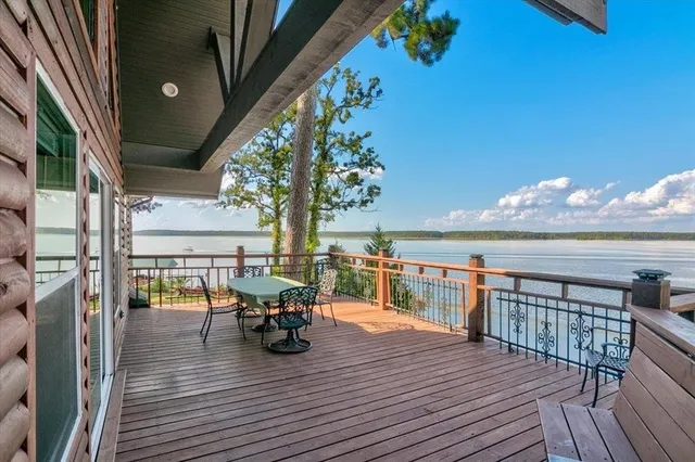 a close up of a table with a lake view