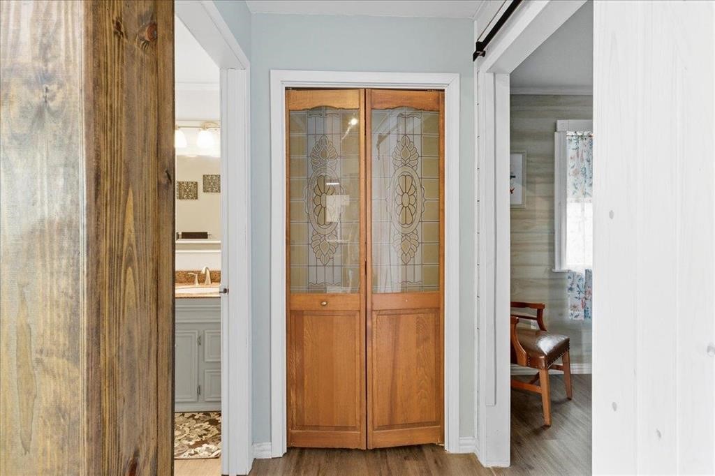 500 Two Coves Hemphill, TX 75948 - Photo 35 of 36 a view of a closet area with living room