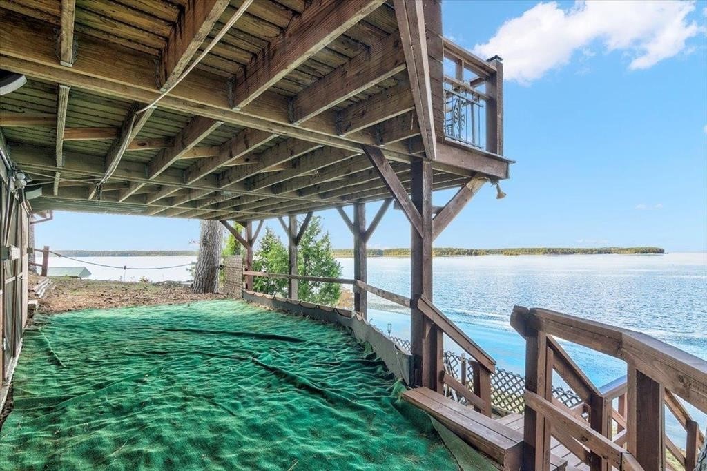 500 Two Coves Hemphill, TX 75948 - Photo 4 of 36 a view of an house with backyard and deck