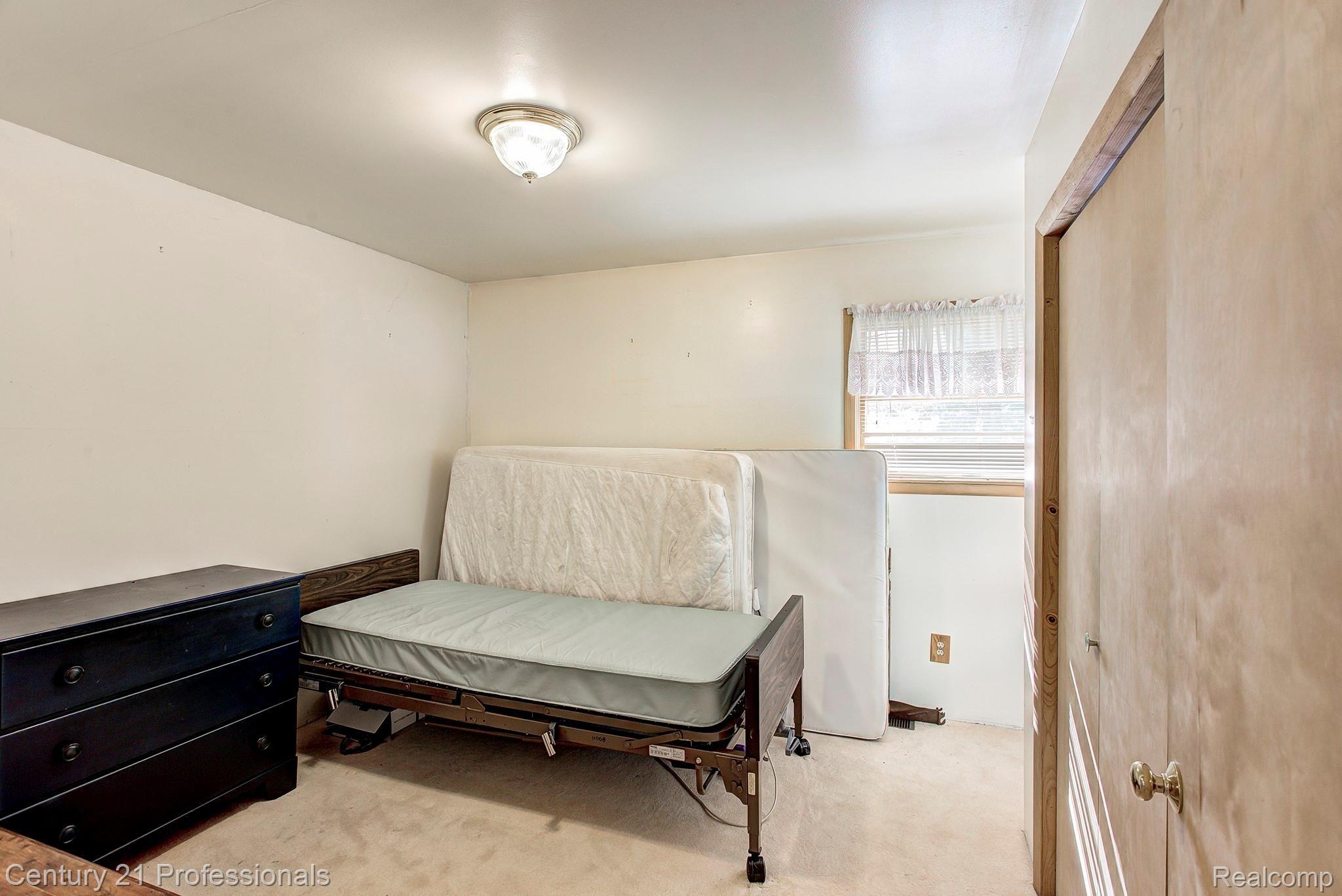 5252 Pleasant Lake Road Howell, MI 48843 - Photo 27 of 41 In-law suite bedroom
