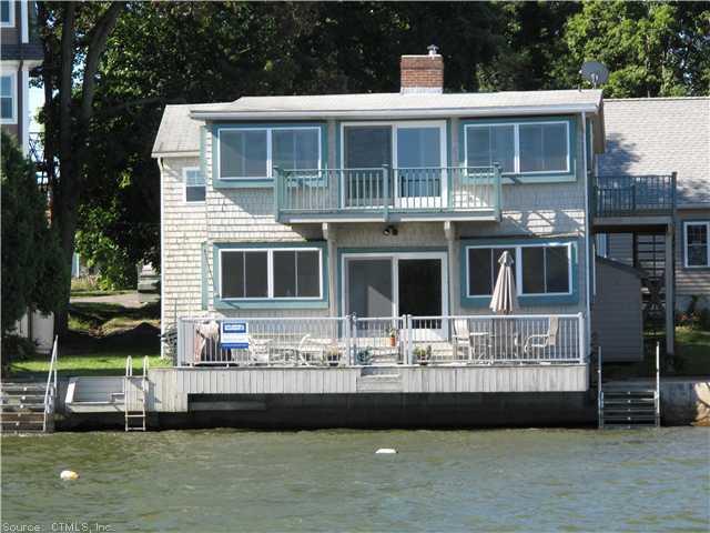 Exterior Front. Waterfront on Lake Pocotopaug. Summer living at its best!