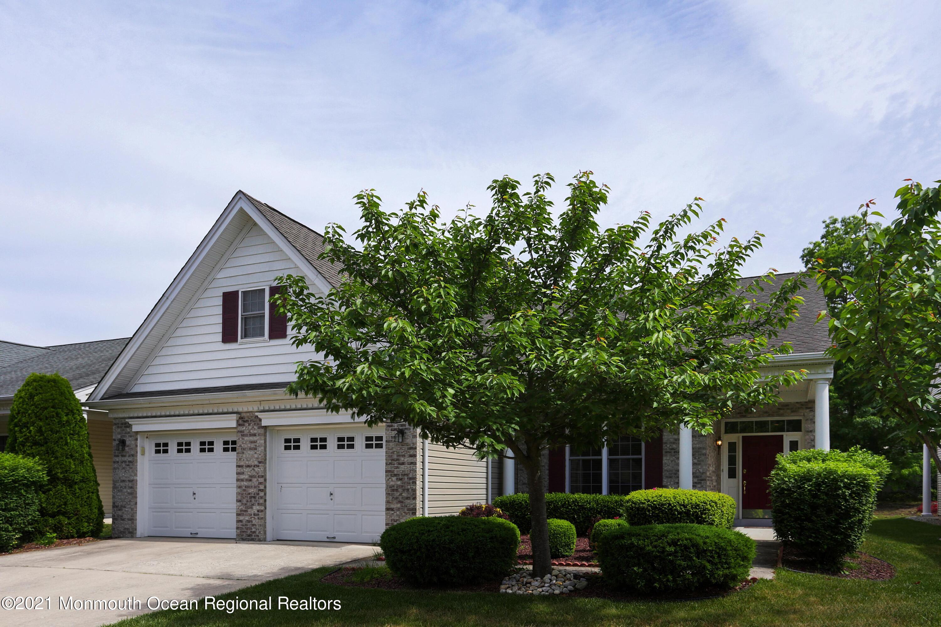 21 Crooked Stick Road Jackson, NJ 08527 - Photo 1 of 37 a house view with a garden space