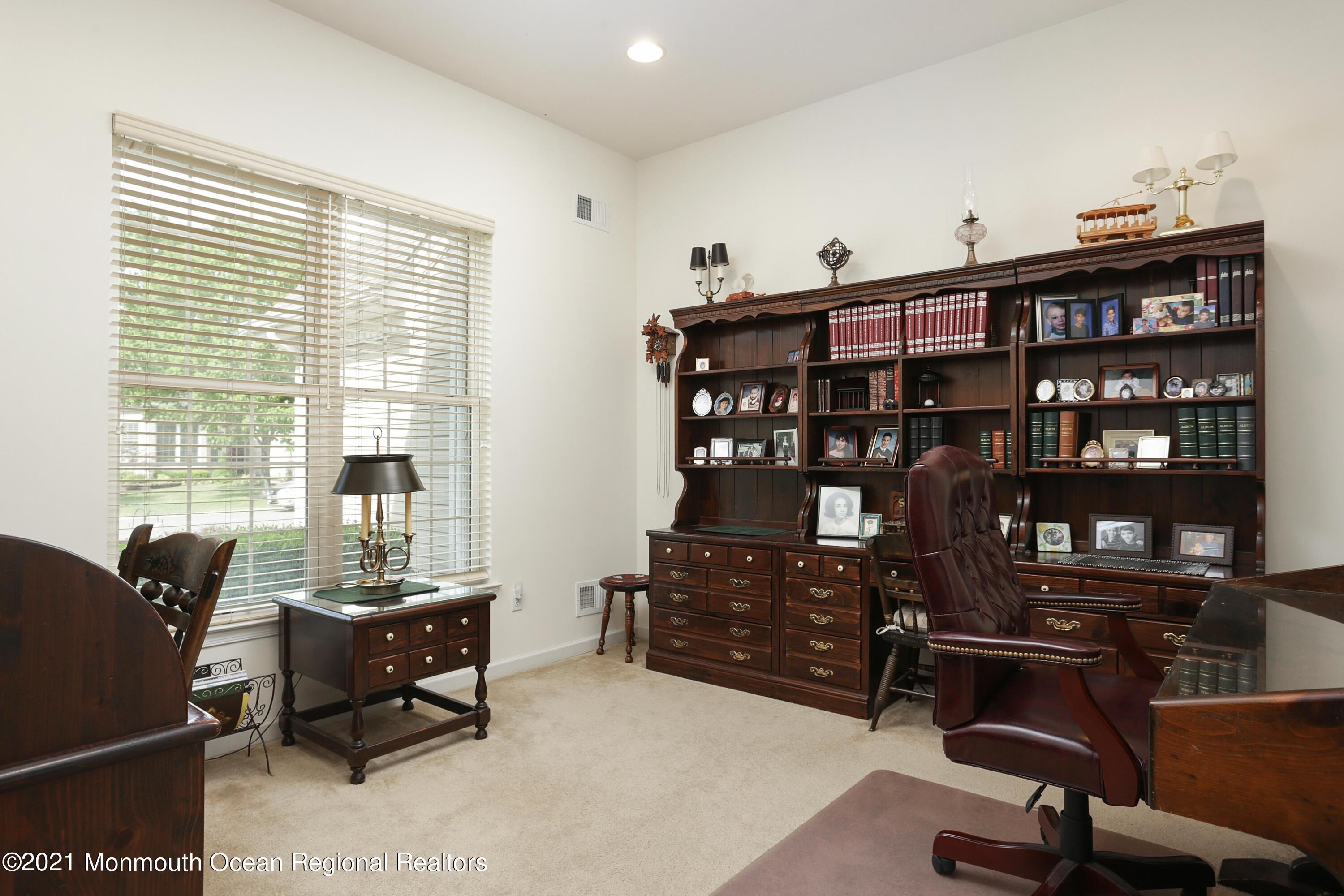21 Crooked Stick Road Jackson, NJ 08527 - Photo 11 of 37 a view of a workspace with furniture and a window