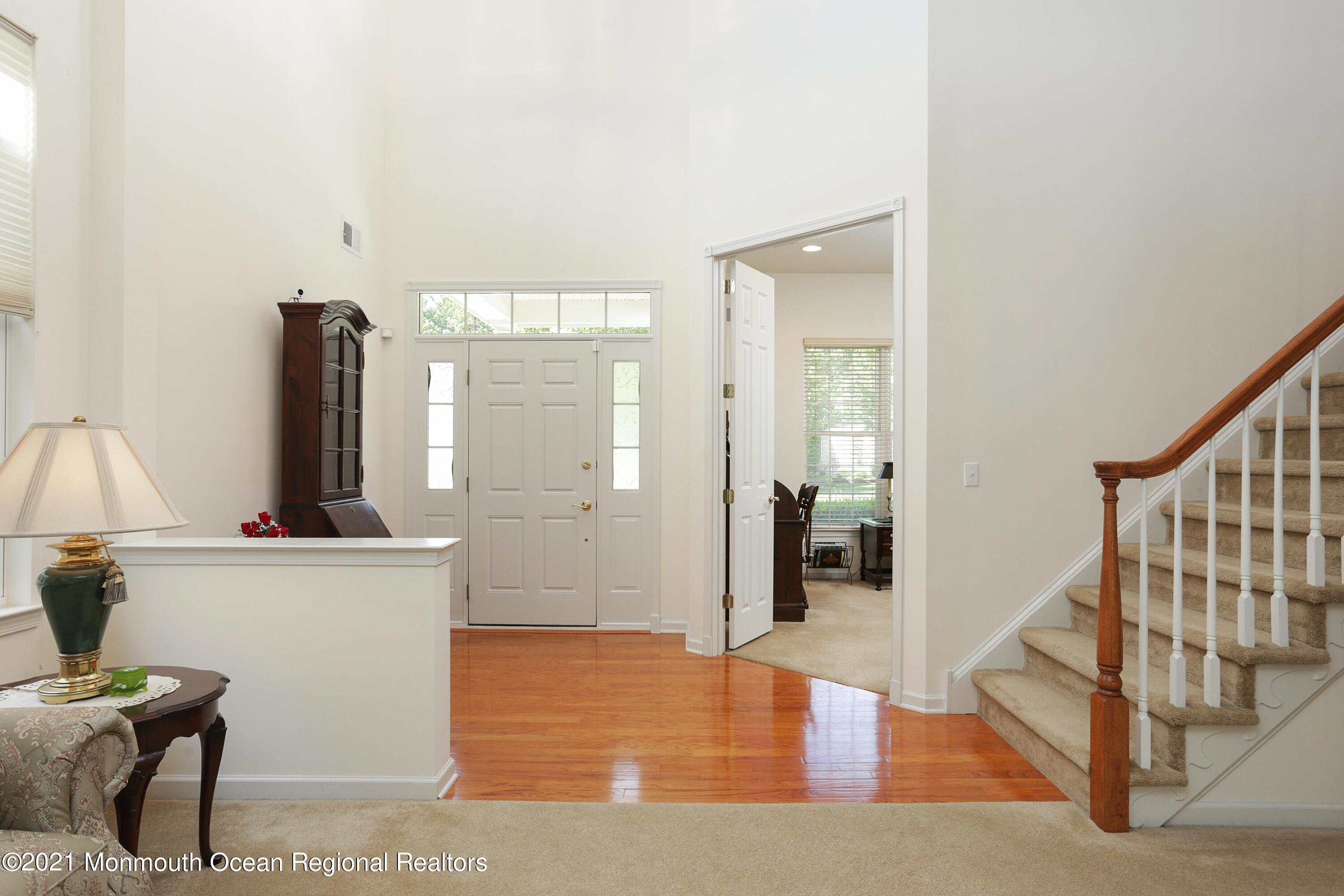21 Crooked Stick Road Jackson, NJ 08527 - Photo 23 of 37 a view of a hallway with workspace and mirror