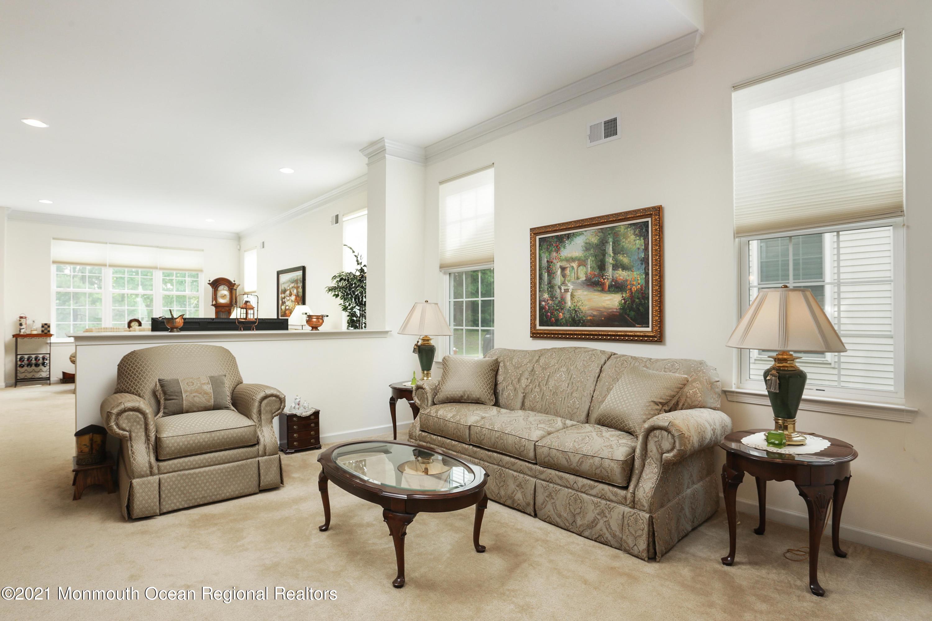 21 Crooked Stick Road Jackson, NJ 08527 - Photo 5 of 37 a living room with furniture and a large window
