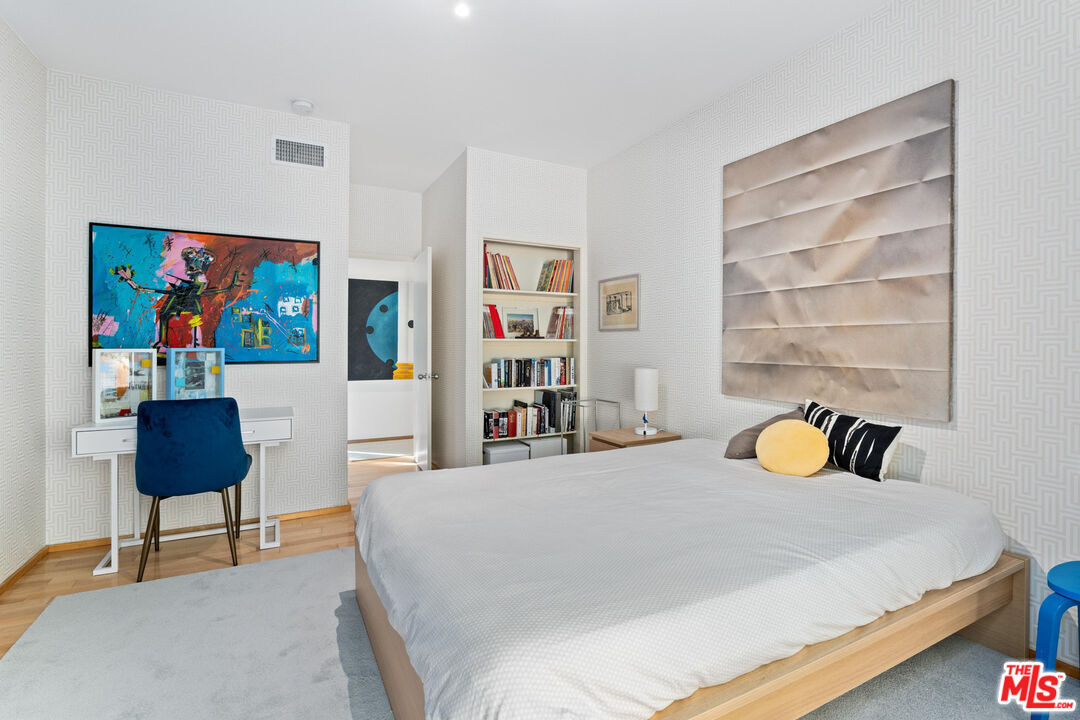 10045 Reevesbury Drive Beverly Hills, CA 90210 - Photo 21 of 32 a bedroom with a bed and dresser