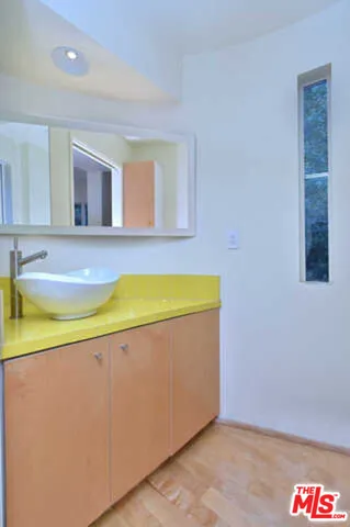 a view of balcony with furniture