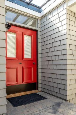 a view of balcony with wooden floor