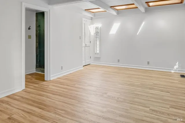 a bathroom with a toilet and a sink