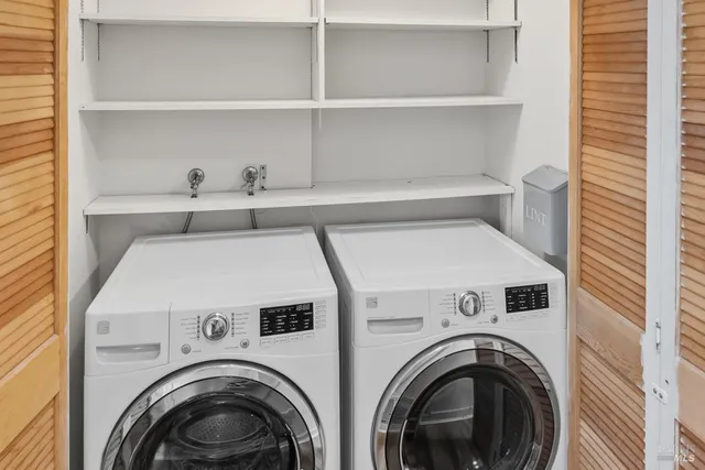 a view of hallway with wooden floor