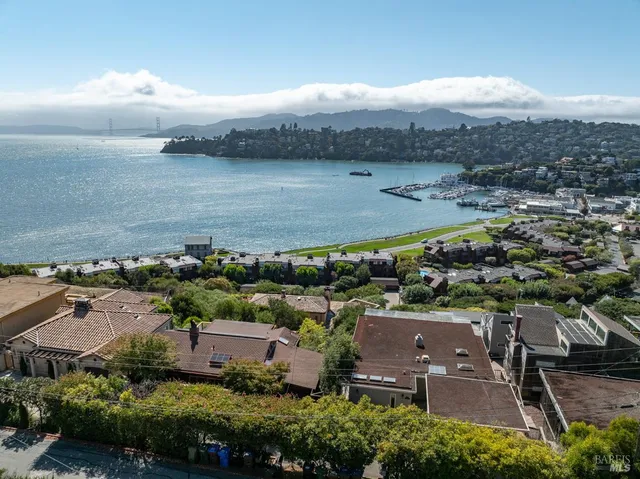 a view of a lake from a balcony