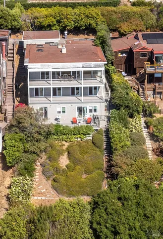 a view of balcony with wooden floor