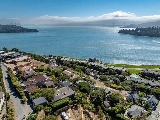 a balcony with wooden floor