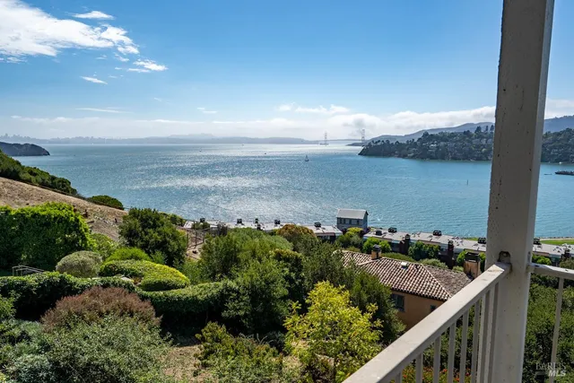 a view of a two chair in the balcony