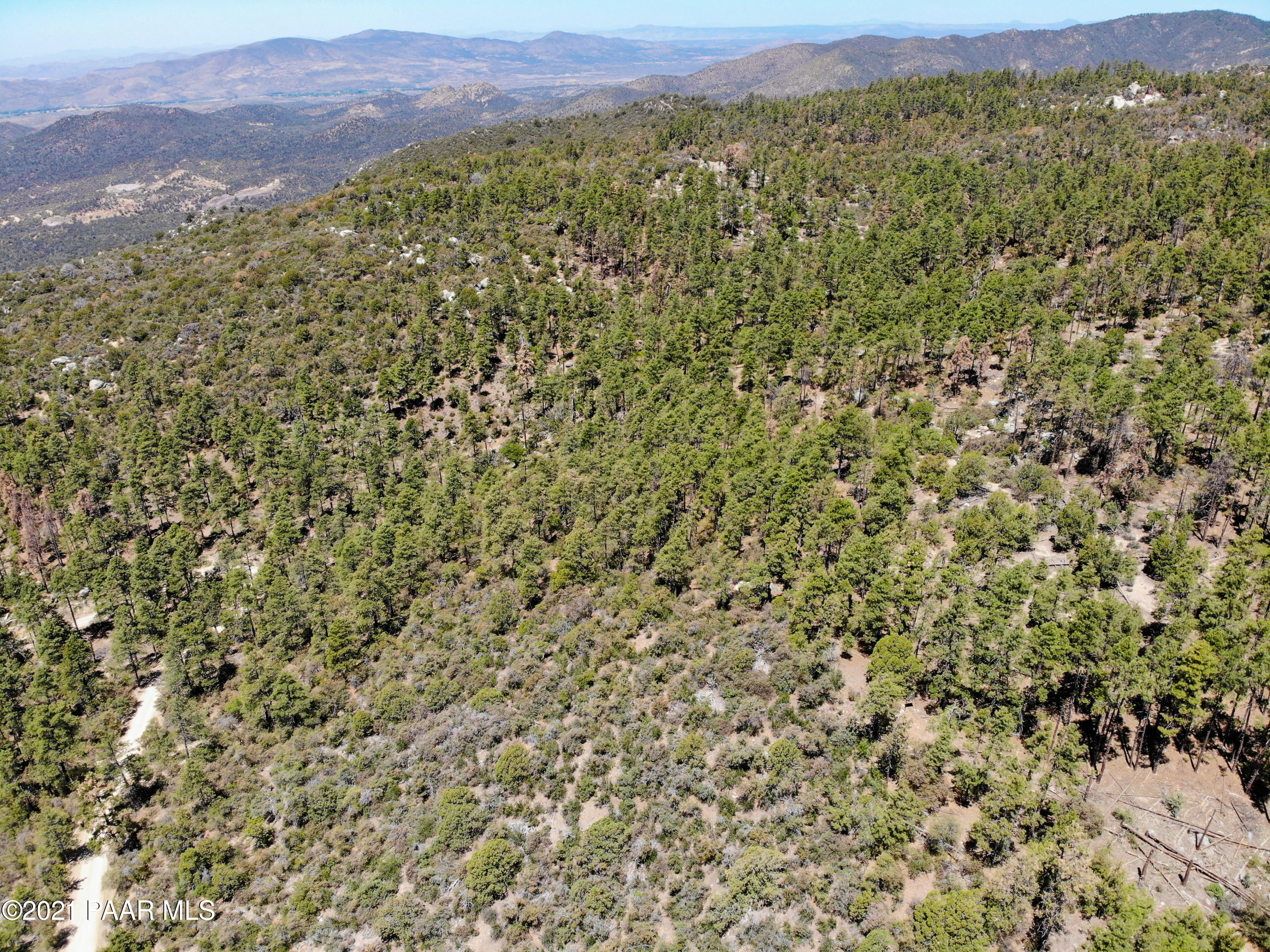 5000 West Copper Basin Road Prescott, AZ 86303 - Photo 8 of 15 a view of a field with mountains in the background