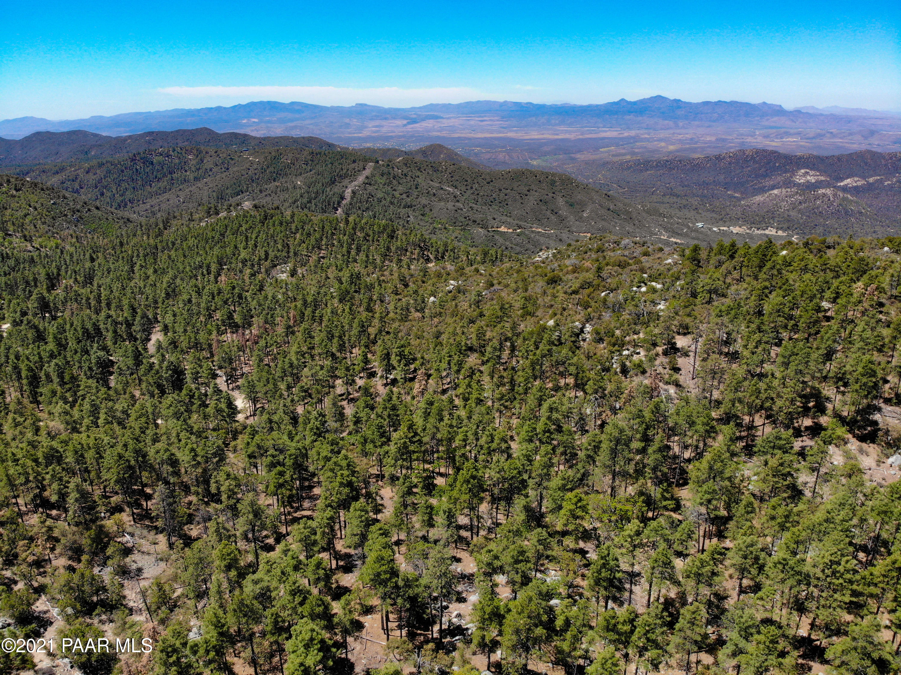 5000 West Copper Basin Road Prescott, AZ 86303 - Photo 9 of 15 a view of a lush green hillside and a mountain
