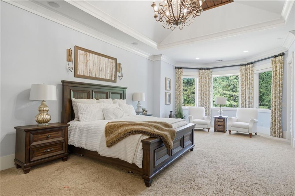 680 Gaddis Road Canton, GA 30115 - Photo 25 of 85 a bed room with a bed and a couch
