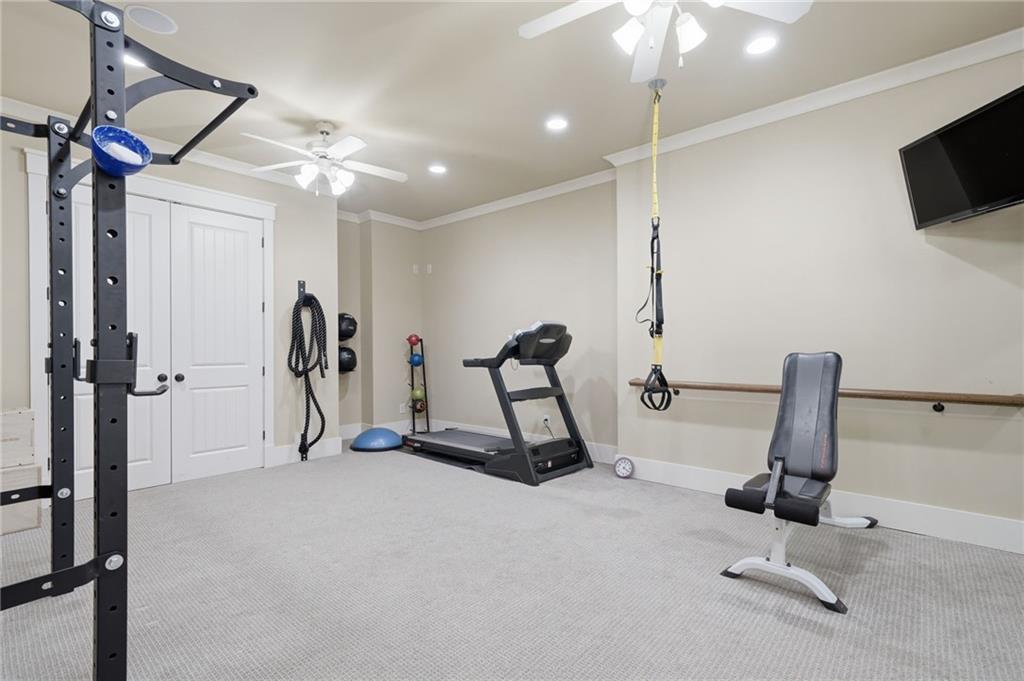 680 Gaddis Road Canton, GA 30115 - Photo 58 of 85 a view of a room with gym equipment