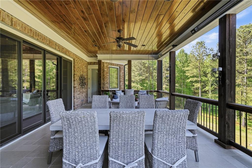 680 Gaddis Road Canton, GA 30115 - Photo 68 of 85 a view of an outdoor dining room with furniture window and outside view