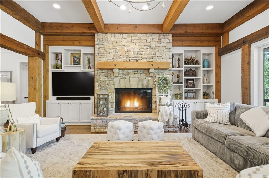 680 Gaddis Road Canton, GA 30115 - Photo 10 of 85 a living room with furniture fireplace and a flat screen tv
