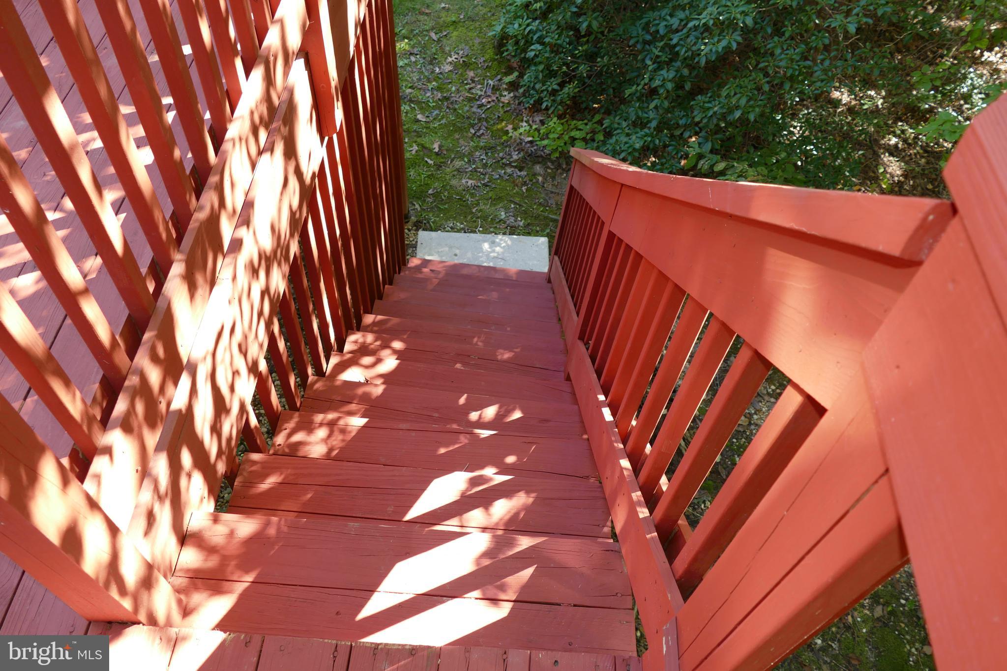 228 Sycamore Ridge Road Laurel, MD 20724 - Photo 9 of 34 Steps from deck to lower yard