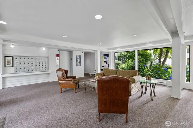 a living room with furniture and a window