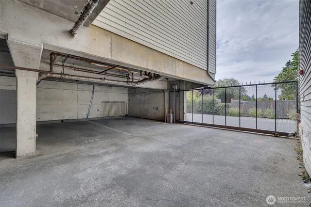 a view of parking area of a garage