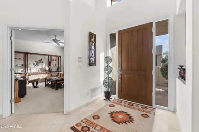 a view of livingroom with furniture and window