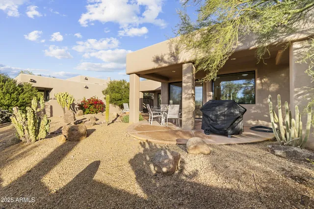 a view of a house with a snow in the yard
