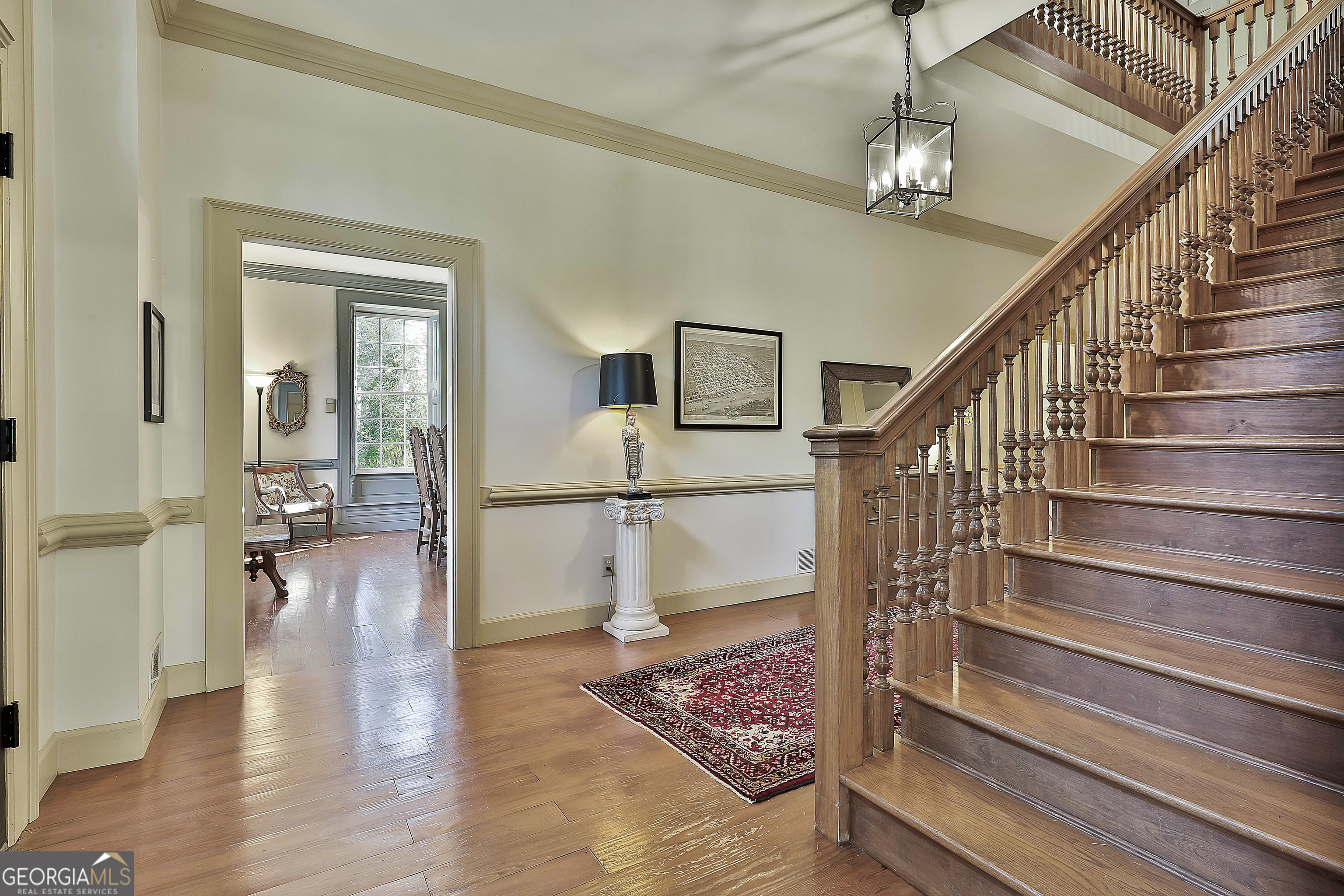 405 North Pine Hill Road Griffin, GA 30223 - Photo 12 of 72 a view of entryway and hall with wooden floor