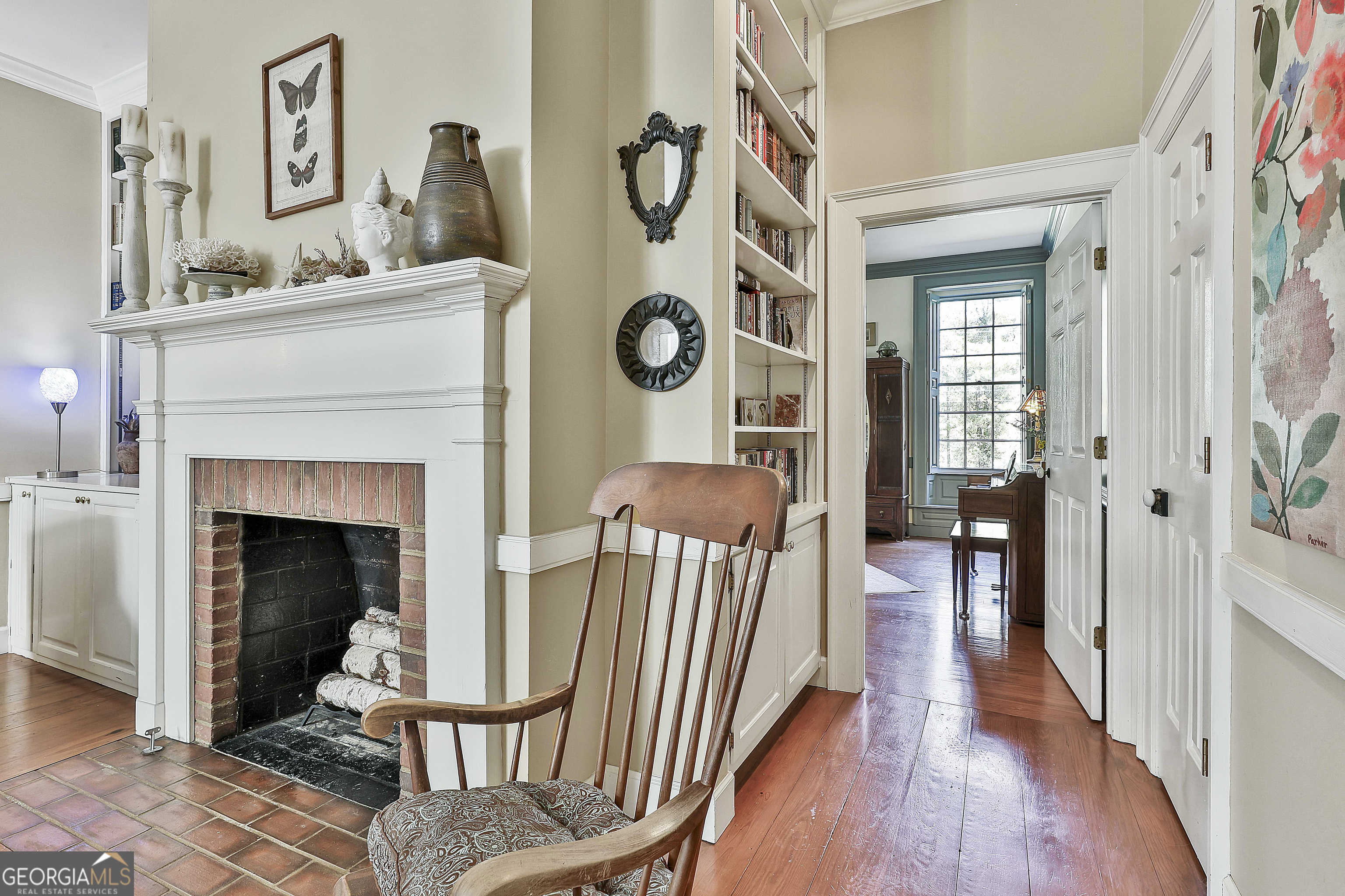405 North Pine Hill Road Griffin, GA 30223 - Photo 33 of 72 a living room with furniture and a fireplace