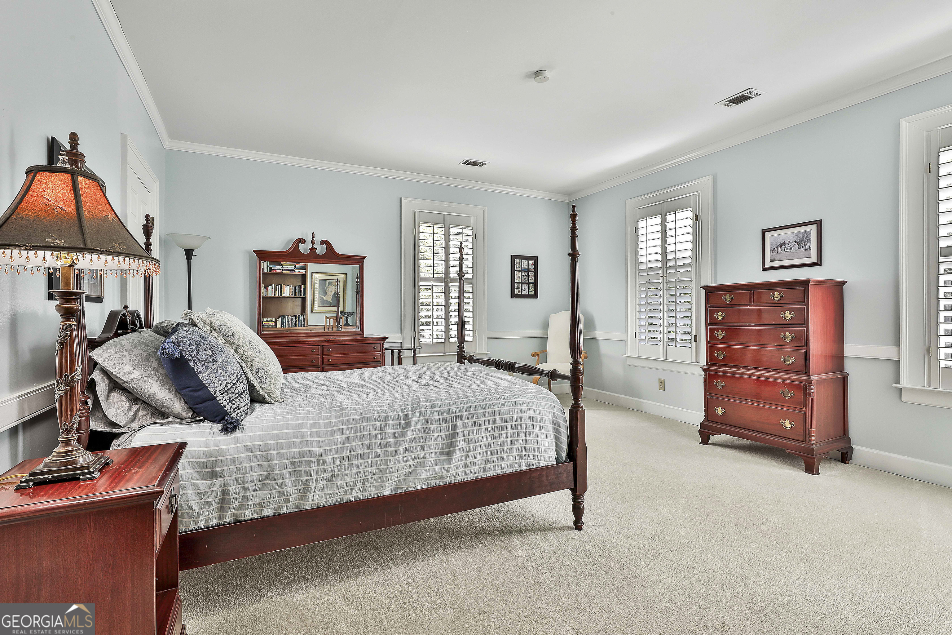 405 North Pine Hill Road Griffin, GA 30223 - Photo 37 of 72 a bedroom with a bed and window