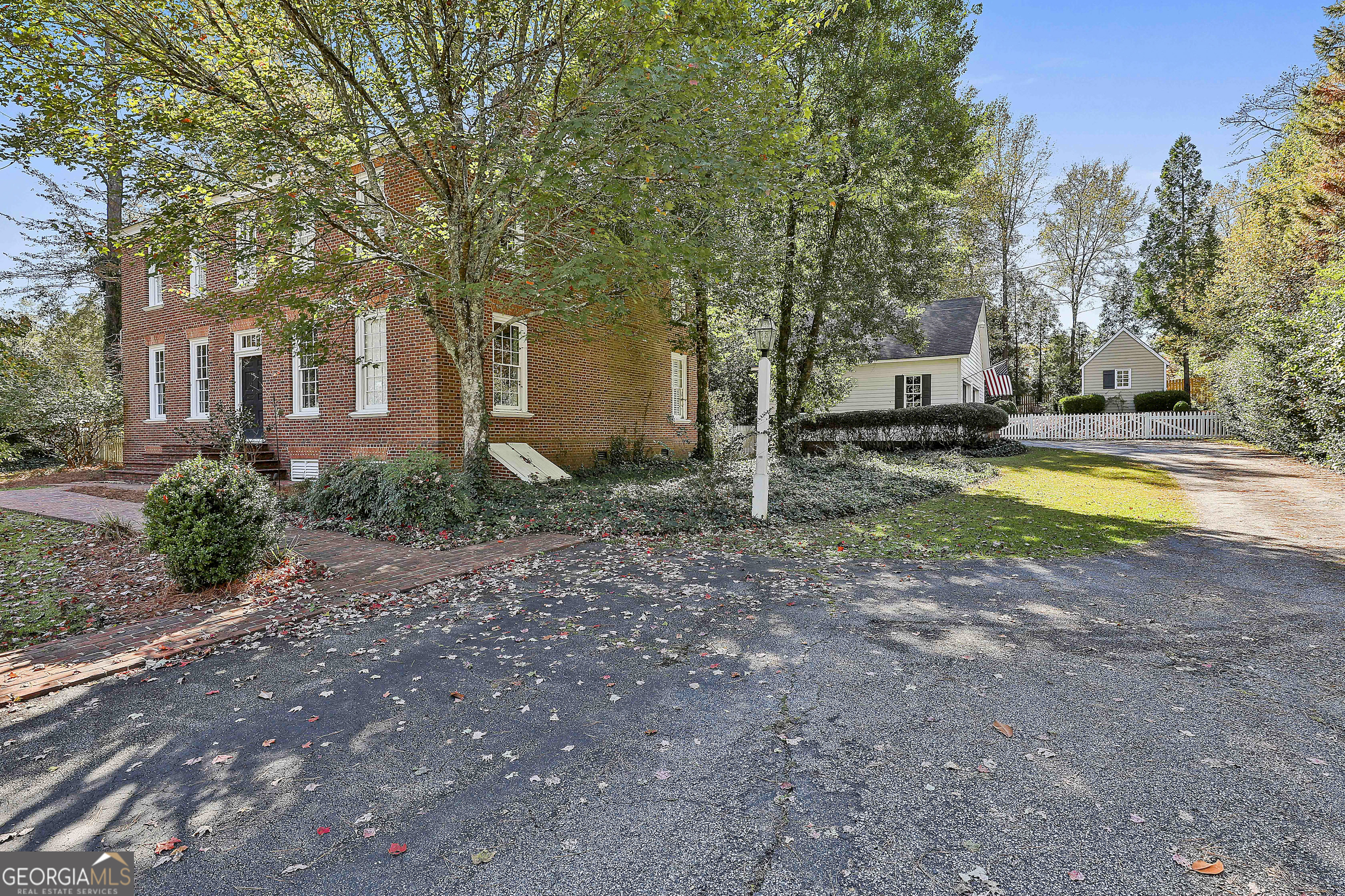 405 North Pine Hill Road Griffin, GA 30223 - Photo 4 of 72 a view of a house with pool and sitting area