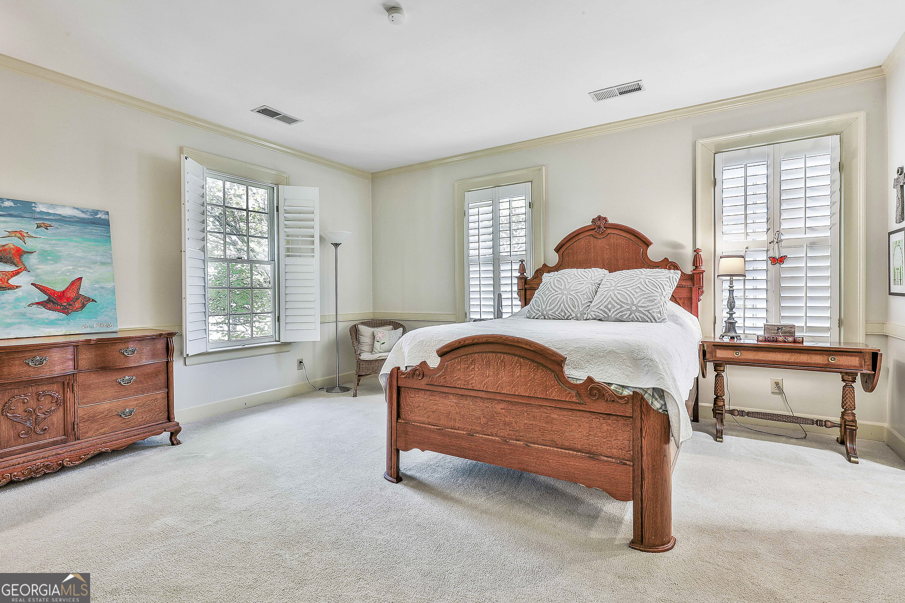 405 North Pine Hill Road Griffin, GA 30223 - Photo 49 of 72 a bedroom with a bed and window