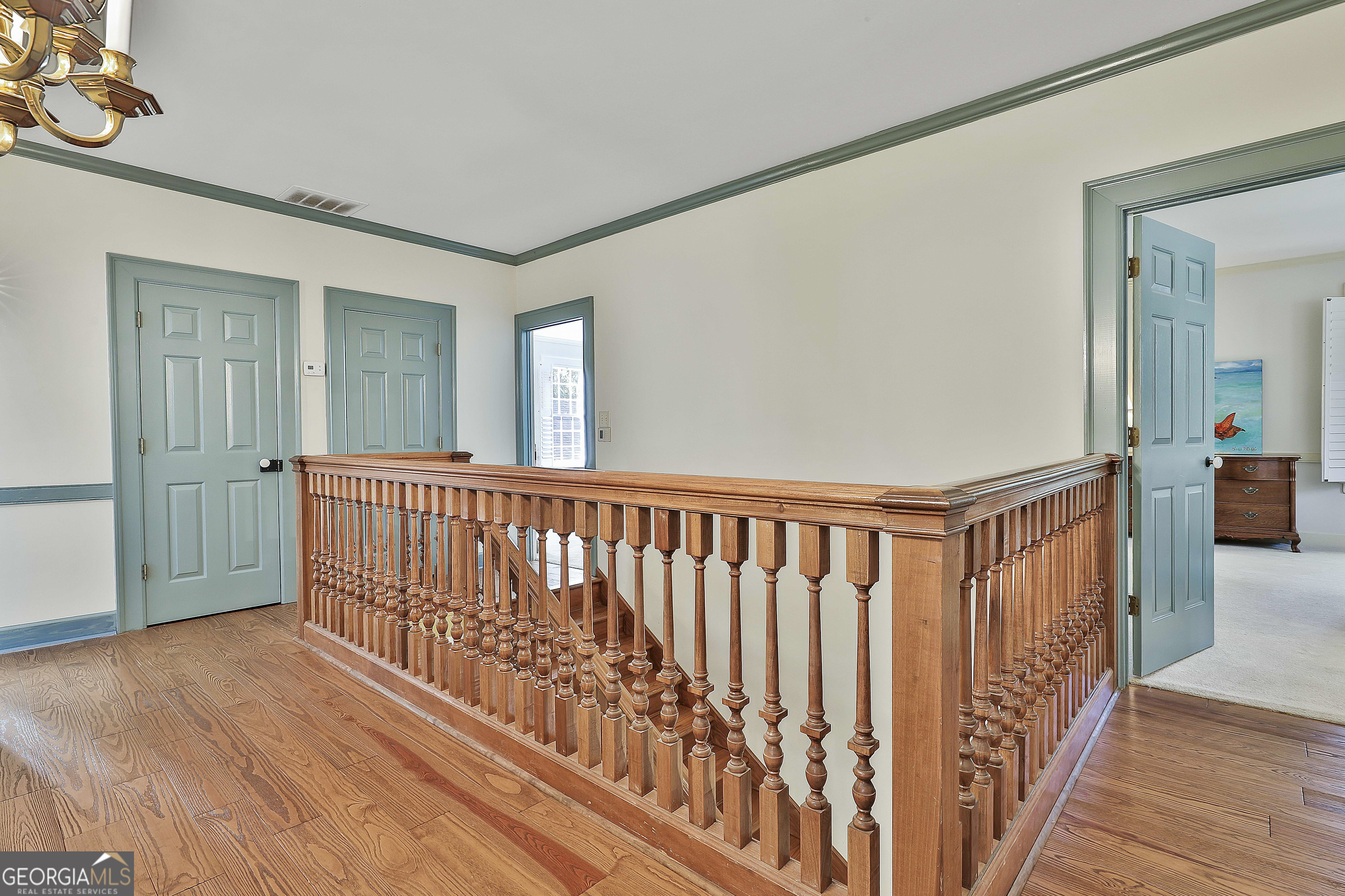 405 North Pine Hill Road Griffin, GA 30223 - Photo 51 of 72 a view of hallway with wooden floor