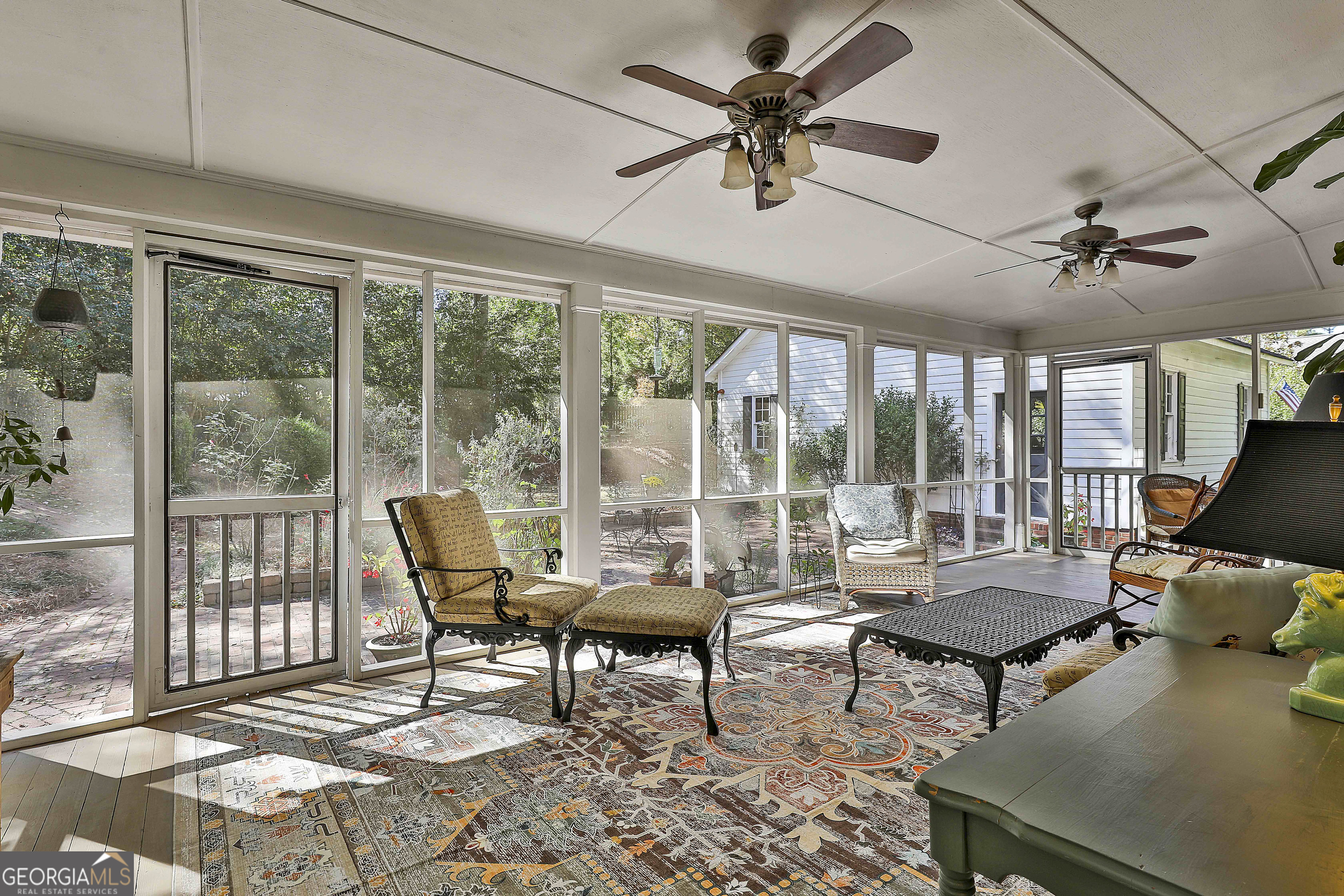 405 North Pine Hill Road Griffin, GA 30223 - Photo 52 of 72 a living room with furniture and floor to ceiling windows
