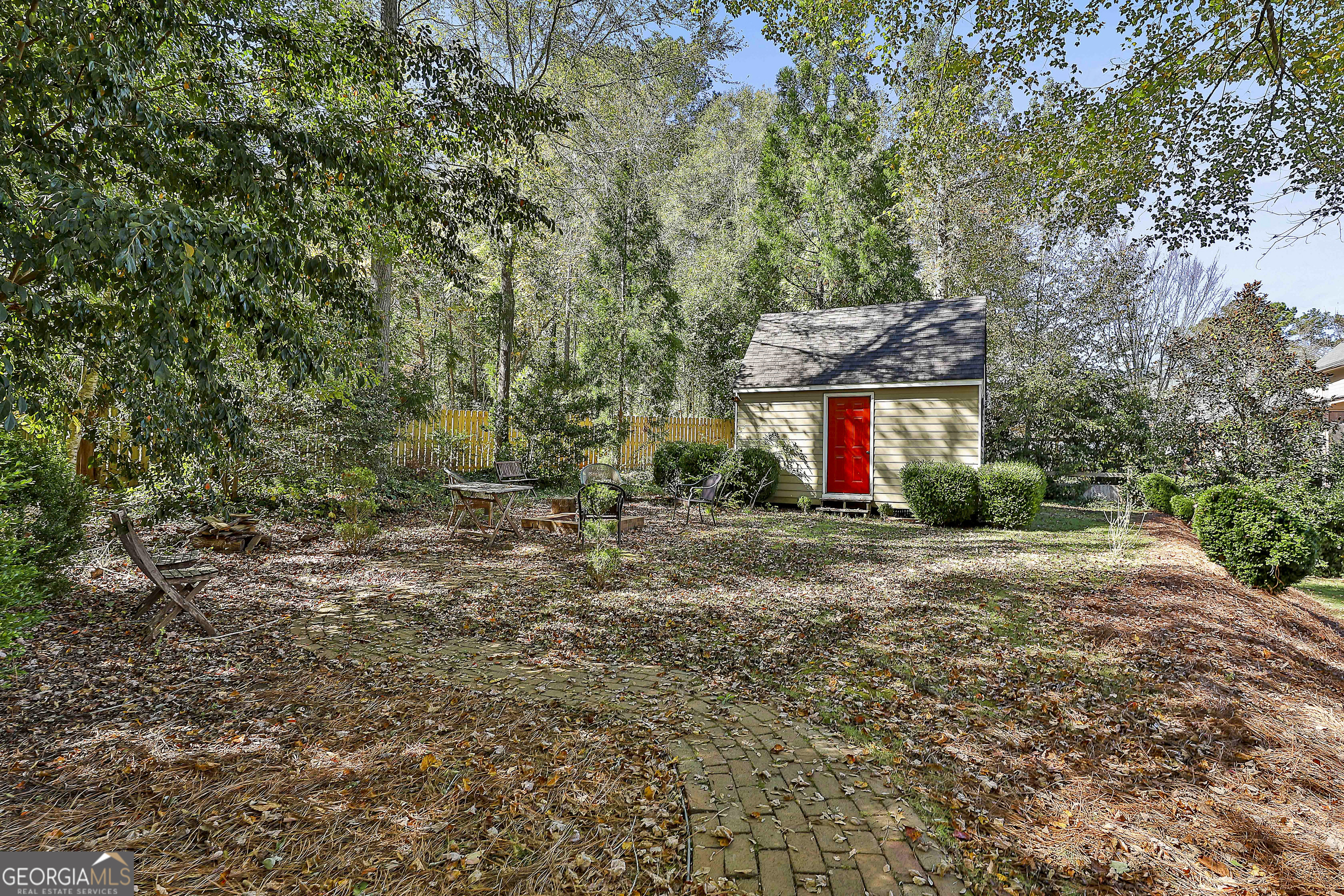 405 North Pine Hill Road Griffin, GA 30223 - Photo 67 of 72 a view of an house with backyard space and garden