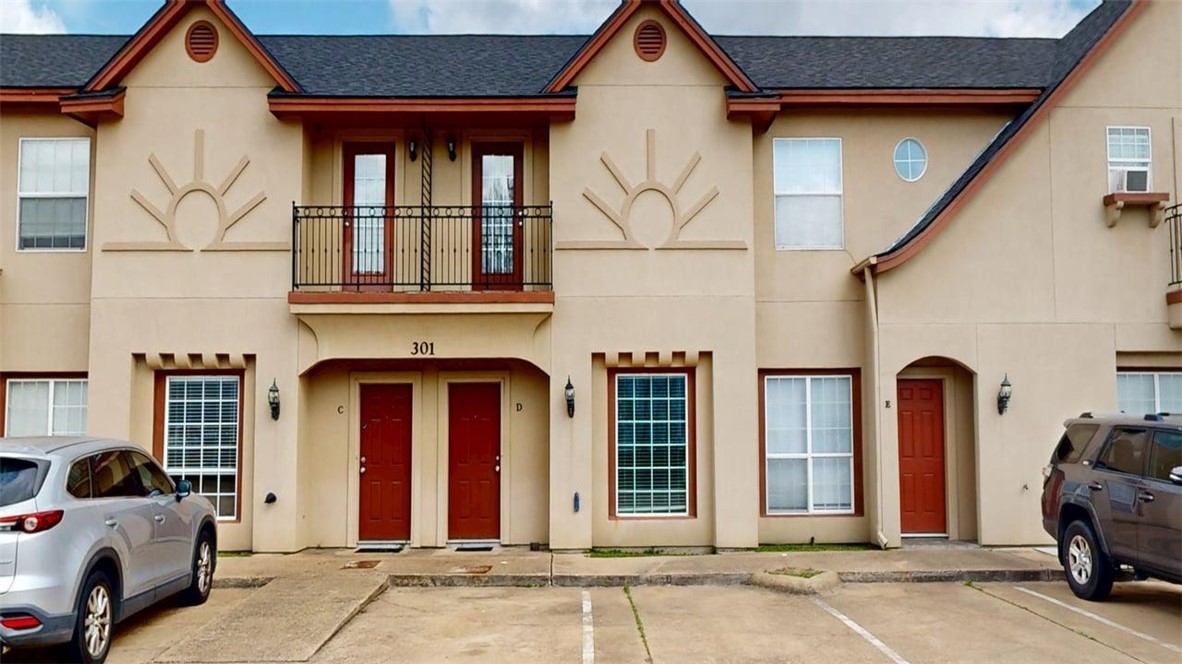301 Nimitz Street, Unit D College Station, TX 77840 - Photo 1 of 1 a view of a car park front of a building